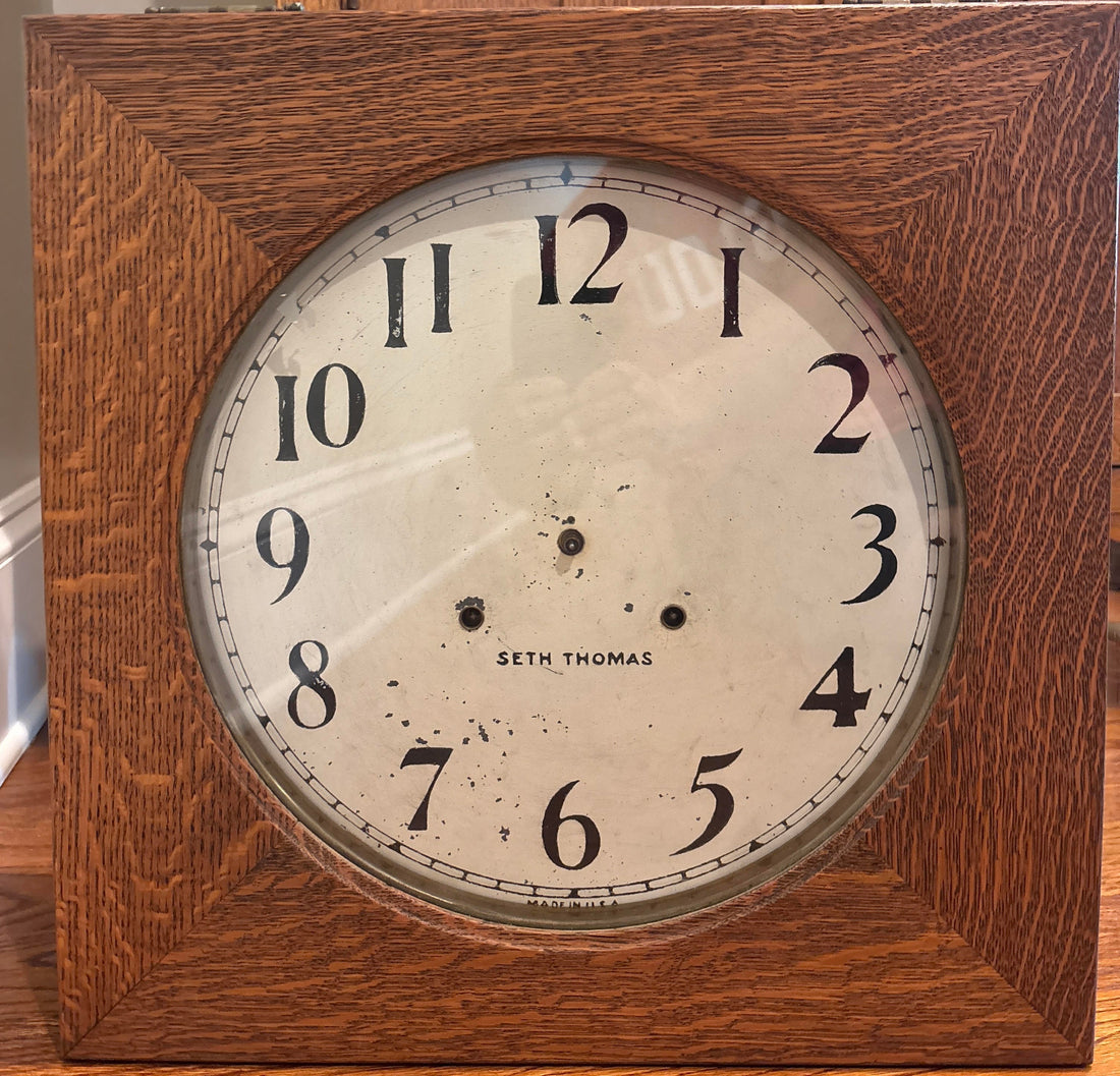 Antique Seth Thomas clock restored in its oak case