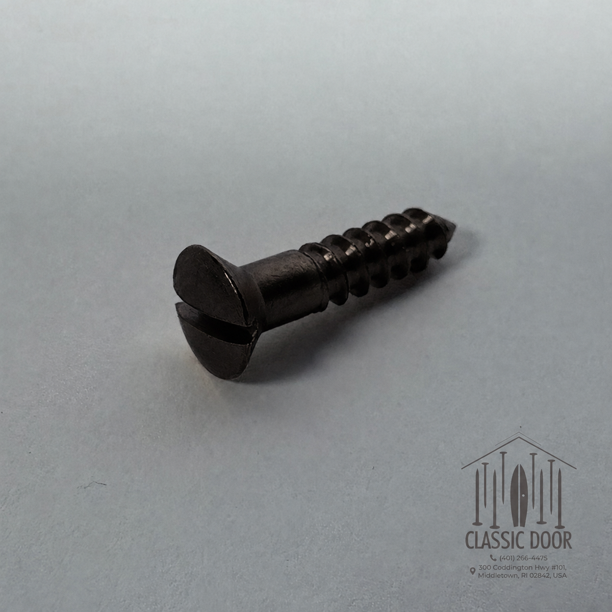 Oil-rubbed bronze oval head slotted solid brass wood screw